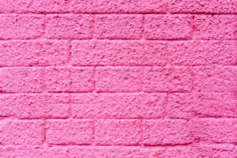 Wall of concrete blocks, painted in different colors Stock Photos