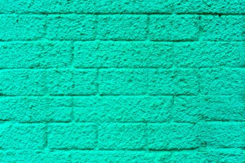 Wall of concrete blocks, painted in different colors Stock Photos