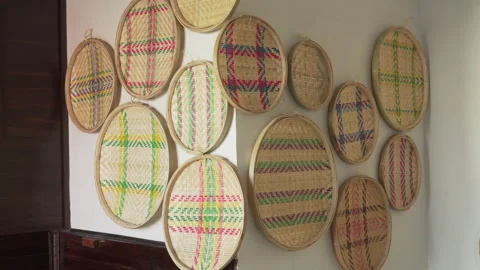 Wall corner adorned with flat basket handmade bamboo Stock Footage 152175288