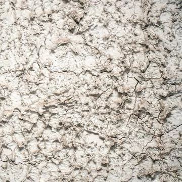 Wall is covered with gray decorative plaster Stock Photos