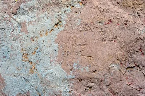 Wall covered with plaster and paint. Wall texture with damages and scratches Stock Photos