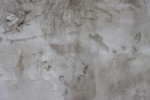 The wall is covered with rough putty. Stock Photos