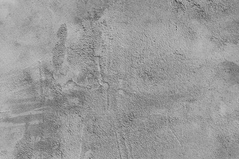 The wall is covered with rough putty. Stock Photos