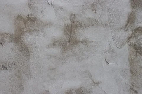 The wall is covered with rough putty. Stock Photos