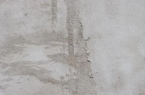 The wall is covered with rough putty. Stock Photos