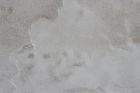 The wall is covered with rough putty. Stock Photos