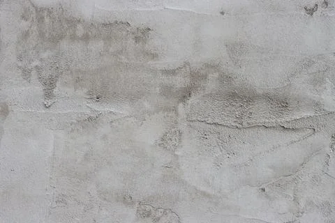 The wall is covered with rough putty. Stock Photos