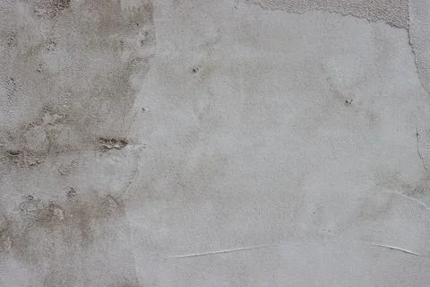 The wall is covered with rough putty. Stock Photos