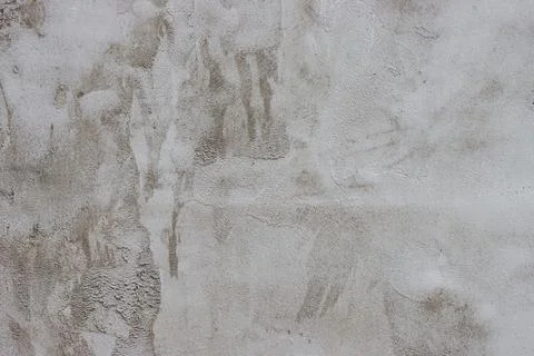 The wall is covered with rough putty. Stock Photos