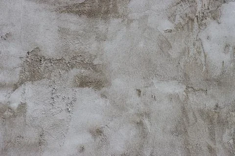 The wall is covered with rough putty. Stock Photos