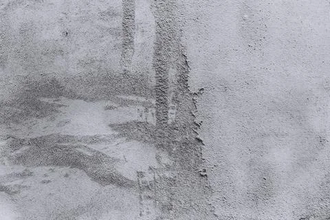 The wall is covered with rough putty. Stock Photos