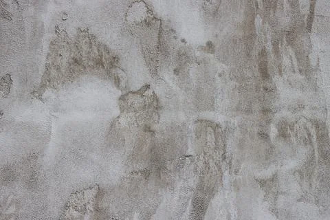 The wall is covered with rough putty. Stock Photos