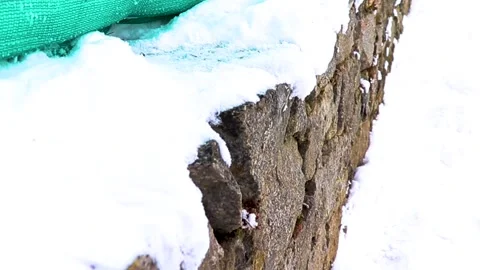 A wall covered with snow during winter. 스톡 동영상 148254249