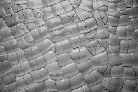 A wall with a cracked surface Stock Photos