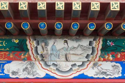 Wall decorations in the long corridor on the Jade Island in Beihai Park of Stock Photos