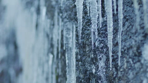 Wall of dripping icicles Stock Footage 297919744