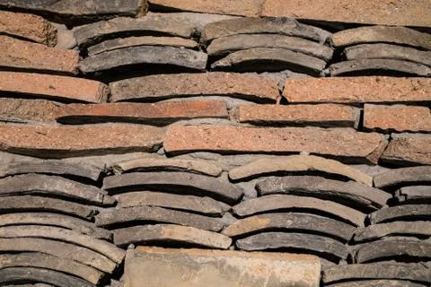 Wall of earthen elements Stock Photos