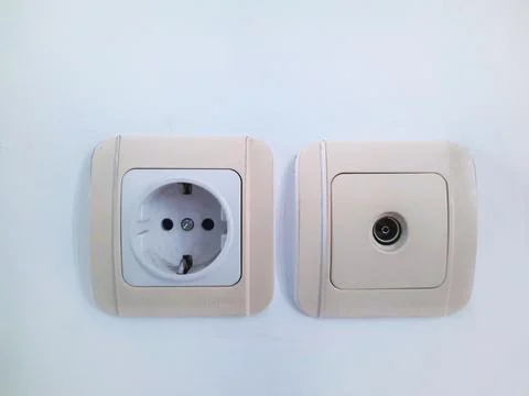 Wall electrical socket and TV antenna socket Stock Photos