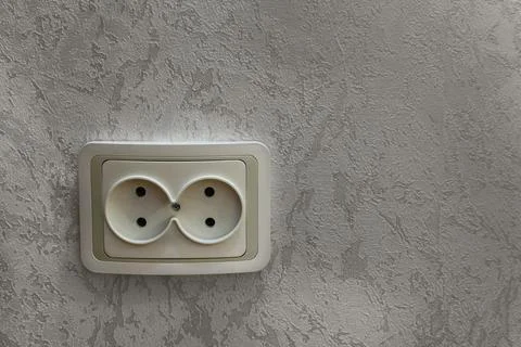 Wall Electrical Socket on Textured Background Stock Photos