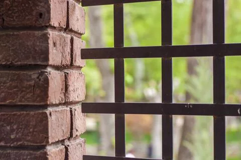 Wall elements. Close-up of the texture. A grate in the wall. Stock Photos