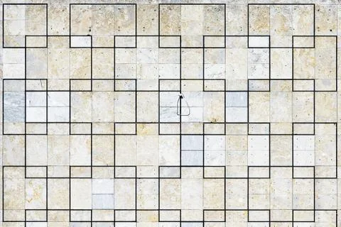 A wall with equal squares intersecting on different parts creating a sense of Stock Photos