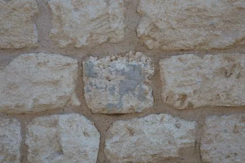 Wall-to-face with exposed rocks and stones Stock Photos