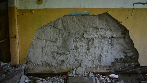 Wall with fallen off plaster, detail of a spooky abandoned interior Stock Footage 140492481
