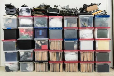 Wall of File Boxes and Office Supplies Stock Photos