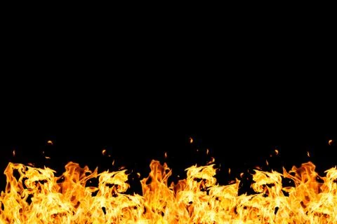 Wall of fire on black background Stock Photos