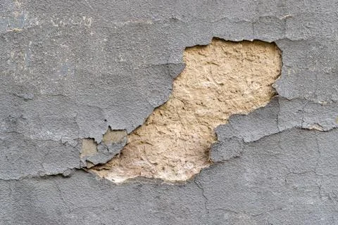 Wall flakes. Old rough stone on cement pattern wall background. Vintage grunge Stock Photos