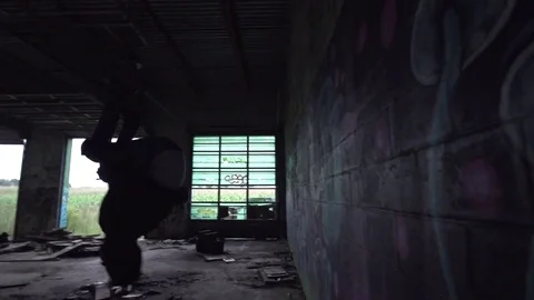 Wall Flip in Abandoned Building Silhouette Stock Footage 80072235