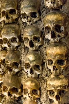 Wall full of skulls and bones in the bone chapel in evora, portugal Stock Photos