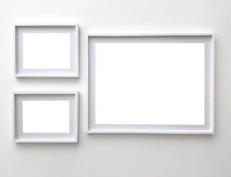Wall in gallery with empty art frames. Blank modern exhibition display with Stock Photos