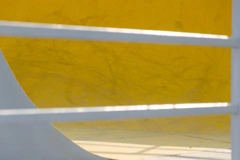 Wall with geometric elements. Mix yellow and grey,  geometric background Stock-Fotos