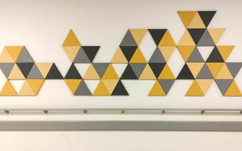 A wall with geometric shapes on it Stock Photos