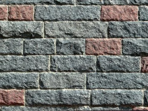 Wall from granite blocks texture background. Stock Photos
