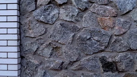 Wall of granite stones booth Stock Footage 98317192