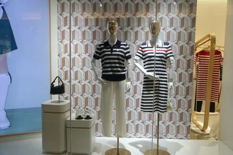 A wall with a graphic pattern inspired by the traditional nautical stripes .. Stock Photos