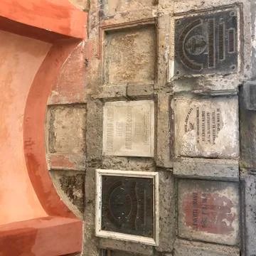 A wall of grave markers Stock Photos