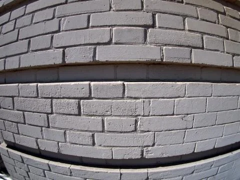 Wall from gray bricks Stock Photos