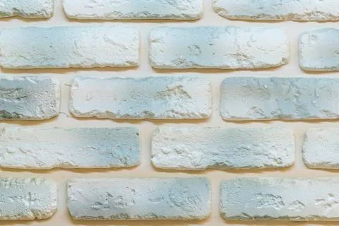 Wall of gray-white brick. background Stock Photos