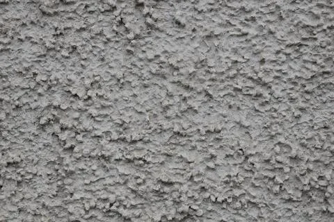 A wall with a grey texture Stock Photos