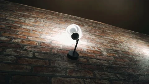 On the wall hangs a small lamp illuminating the space. Smooth camera movement Stock Footage 220151577