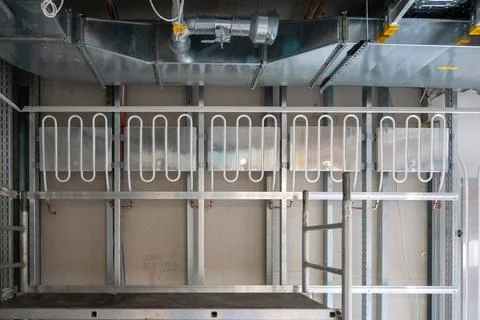 A wall heating system is installed in the new operating theater building Fotos de archivo