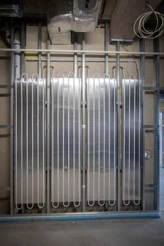 A wall heating system is installed in the new operating theater building Fotos de archivo