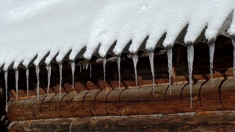 The wall house. icicles of ice Stock Footage 71836672