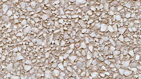 Wall of immured beige rubble moving sideways 動画素材 246851508