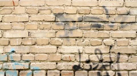 Wall with inscriptions. White brick Stock Footage 10947586