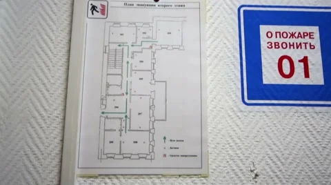 Wall inside building with map and sign IN CASE OF FIRE CALL 01 Vídeos de archivo 45307724