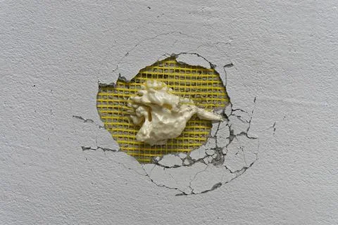 Wall insulation hole Stock Photos